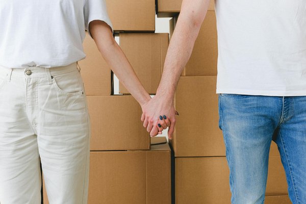 How can I utilize vertical space effectively in small rooms?